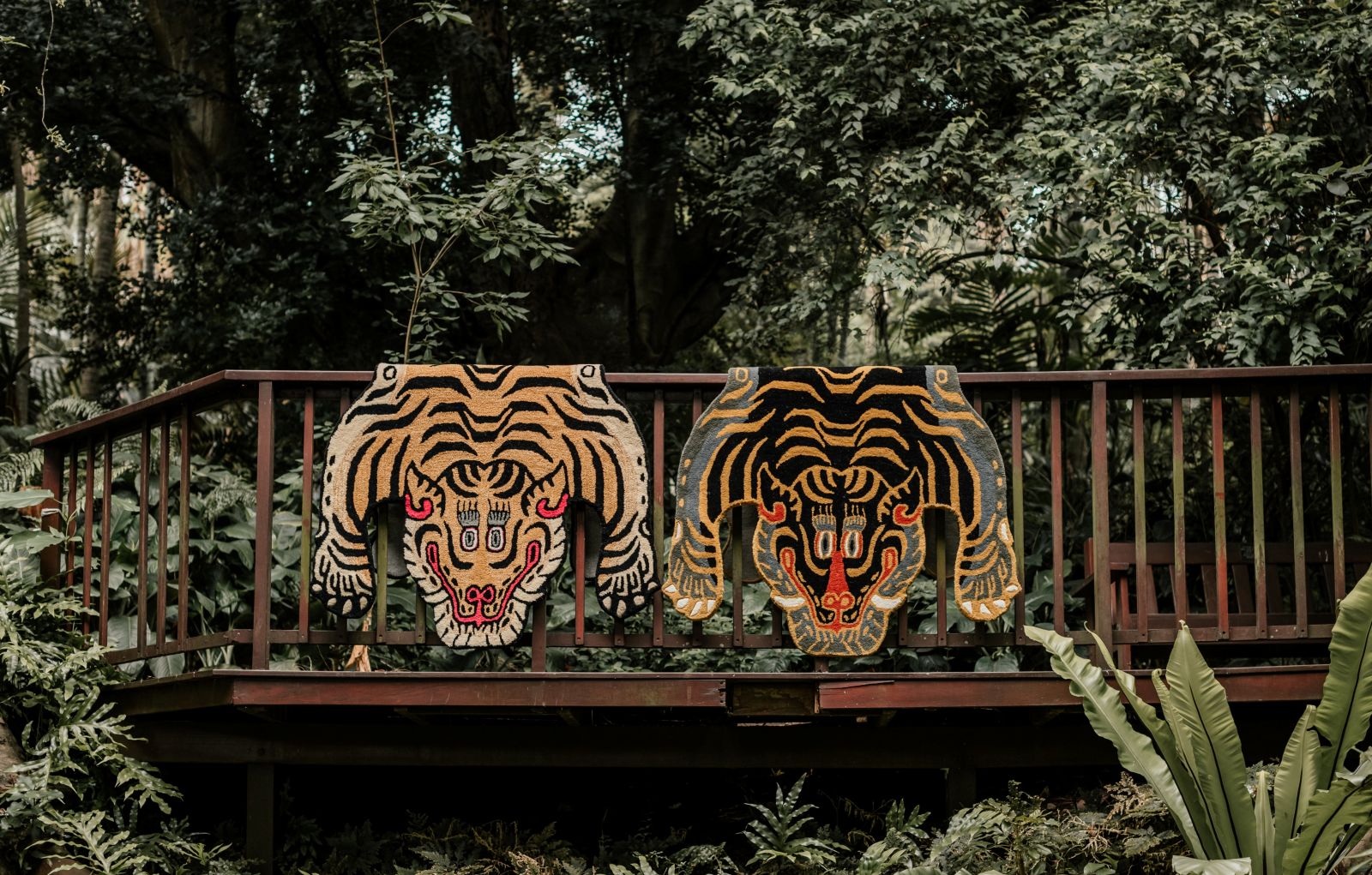two wool tibetan tiger rugs hanging on a wall, statement rugs in south africa