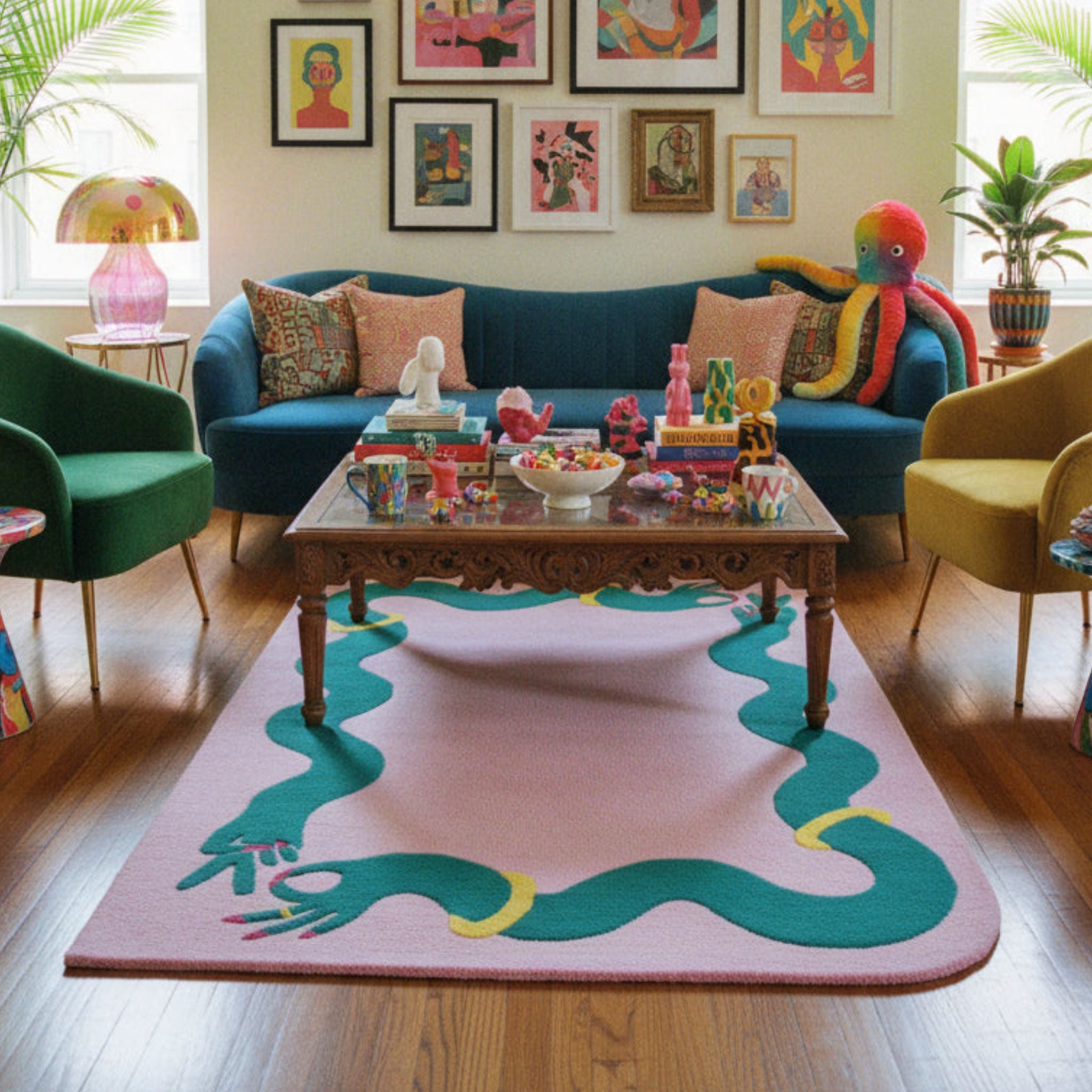 Maximalist decorated living room with large pink wool statement rug under a coffee table
