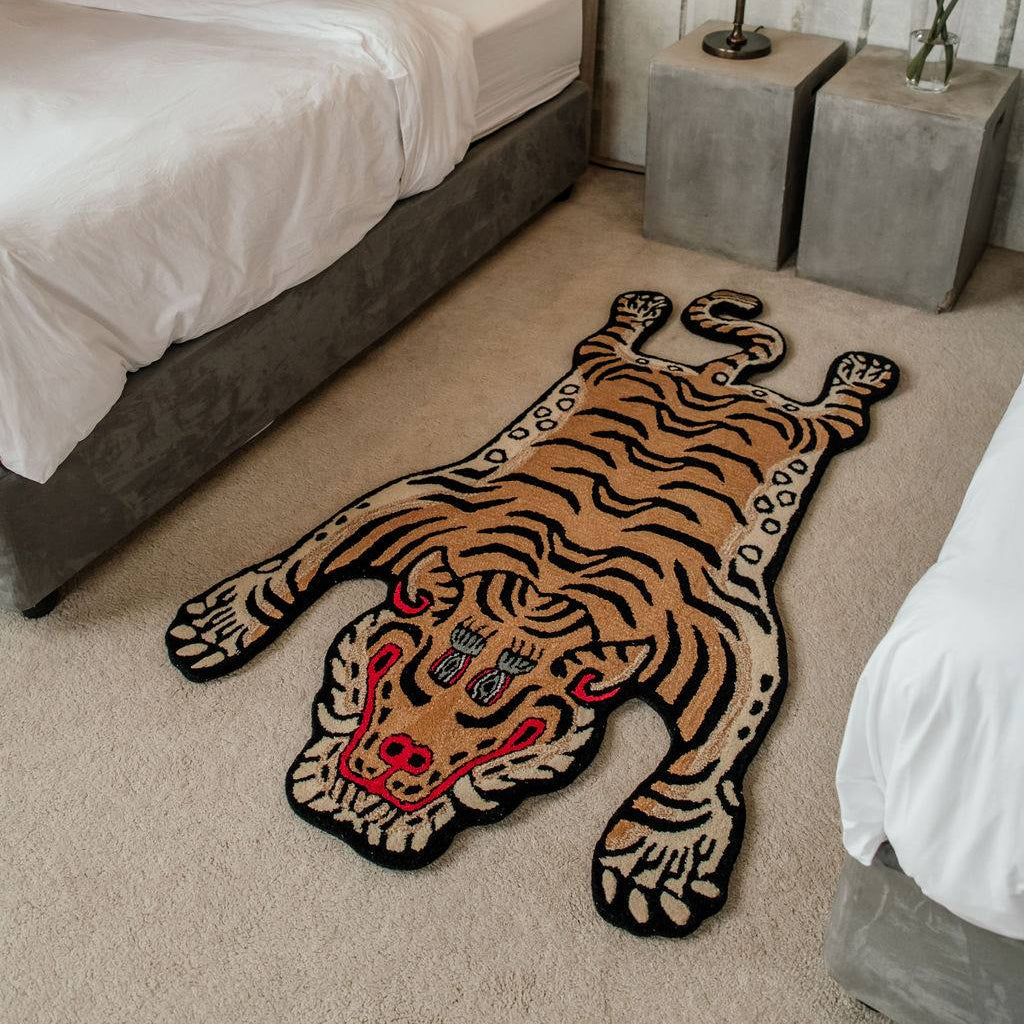 Kids bedroom with a wool tiger rug on the floor