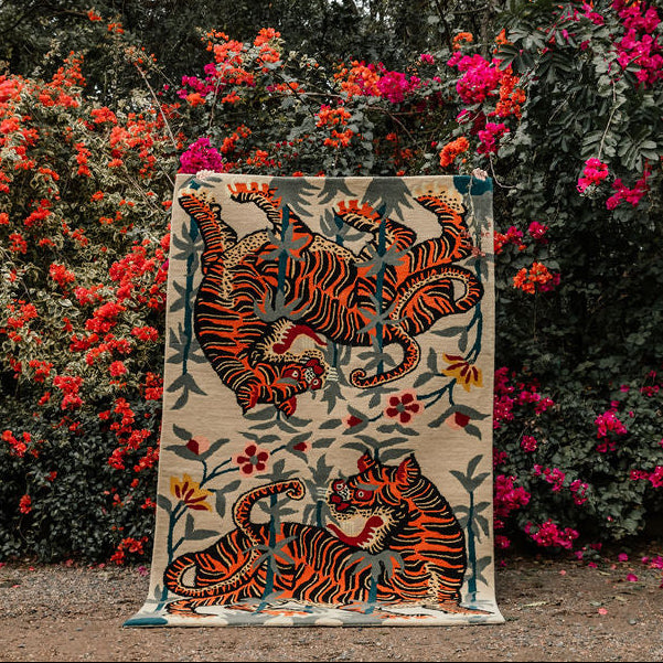 Hand-tufted wool Tibetan tiger statement rug in south africa, with traditional tibetan tiger motifs